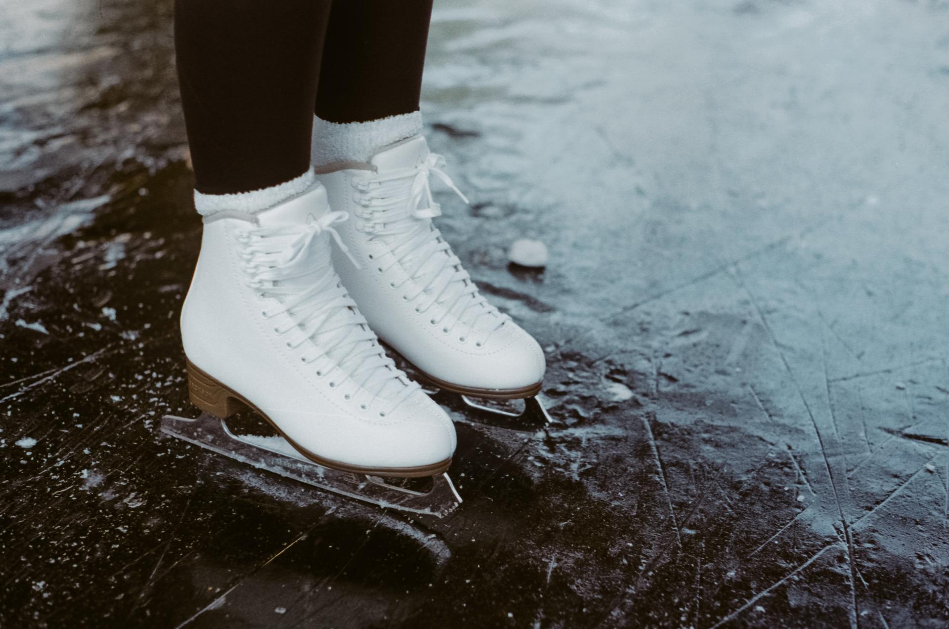 Woman ice skating on holiday in France