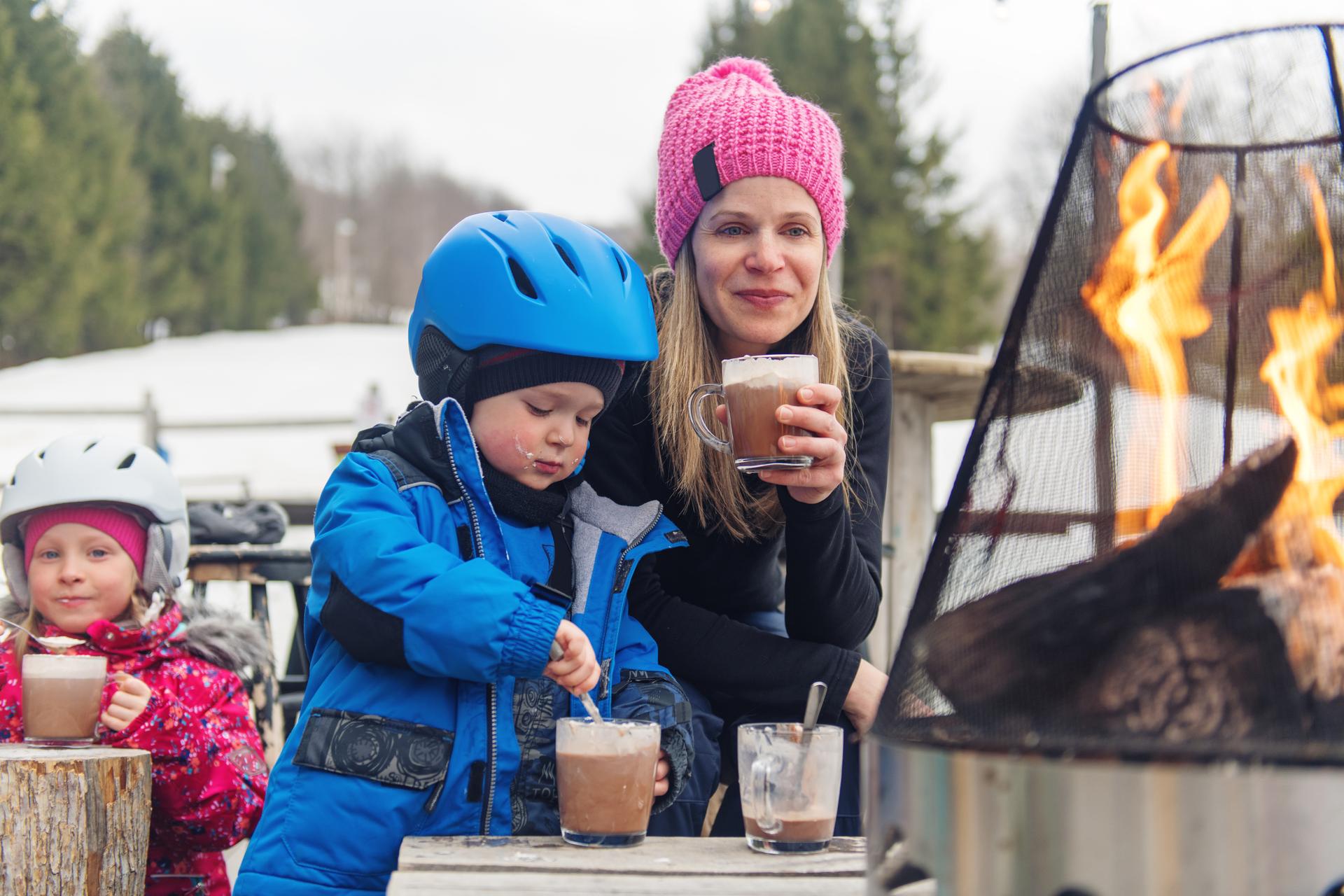 Les-Angles family having hot chocolate